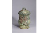 AN ARCHAIC BRONZE 'TAOTIE' WINE VESSEL AND COVER