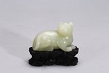 A CHINESE WHITE JADE MYTHICAL BEAST