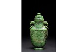 A LARGE SPINACH GREEN JADE 'TAOTIE' VASE