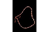 A CENTRAL ASIAN RED CARNELIAN AGATE BEAD NECKLACE