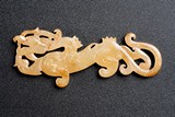 A CHINESE YELLOW JADE CARVING OF DRAGON