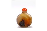 A CHINESE AGATE 'ELDER' SNUFF BOTTLE