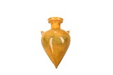 AN UNUSUAL YELLOW GLAZED CONICAL VASE