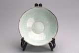 A CHINESE QINGBAI MOULDED 'LOTUS' DISH