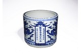A BLUE AND WHITE DRAGONS INSCRIBED JARDINIERE