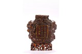 A CHINESE AGARWOOD CARVED WALL VASE