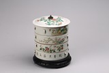 A CHINESE QIANJIANG 'FLOWERS' INSCRIBED FOUR TIER BOX