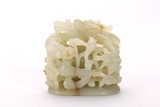 A WHITE JADE DRAGON RETICULATED FINIAL