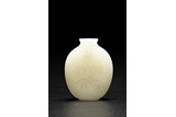 A WHITE JADE INSCRIBED 'FLOWERS' SNUFF BOTTLE