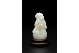 A CHINESE WHITE JADE CARVING OF DOUBLE GOURD