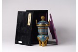 A CHINESE CLOISONNE ENAMEL TRIPOD CENSER AND BOX