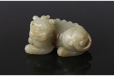 A CHINESE JADE CARVED BUDDHIST LION