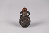 A CHINESE SILVER 'DRAGON' SNUFF BOTTLE