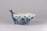 A BLUE AND WHITE 'LOTUS' PEACH FORMED WASHER