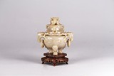 A CHINESE JADE TRIPOD CENSER WITH STAND