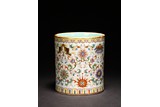 A CHINESE FAMILLE ROSE 'EIGHT BUDDHIST SYMBOLS' BRUSHPOT