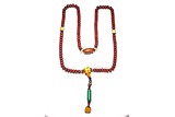 A CHINESE OR TIBETAN BUDDHIST RED PUTI BEAD NECKLACE