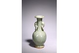 A CELADON GLAZED VASE 