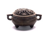 A BRONZE TRIPOD CENSER AND COVER