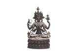 A TIBETAN COPPER ALLOY FOUR ARMED BODHISATTVA 