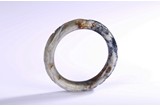 A JADE CARVED 'CHILONG' BANGLE