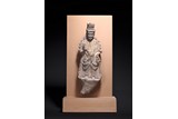 A CHINESE ARCHAIC STONE BODHISATTVA CARVING