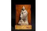 A RARE CHINESE ARCHAIC STONE CARVING OF GUARDIAN KING
