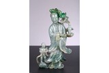 A LARGE JADEITE CARVED GUANYIN AND CHILD