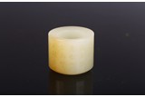 A WHITE JADE INSCRIBED ARCHER'S RING