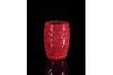 A RED PEKING GLASS 'MASK' CUP