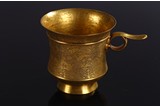 A CHINESE GILT BRONZE ENGRAVED WINE CUP