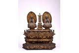 A GILT LACQUER INSCRIBED WOODEN BUDDHA GROUP 