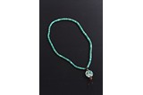 AN ARCHAIC TURQUOISE BEAD NECKLACE