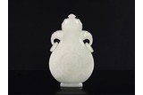 A CHINESE WHITE JADE 'DRAGON' MOONFLASK 