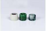 THREE CHINESE ARCHER'S GLASS AND JADEITE RINGS