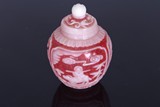 A WHITE OVERLAY RED PEKING GLASS JAR AND COVER