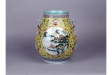 A FAMILLE ROSE YELLOW GROUND 'LANDSCAPE' VASE