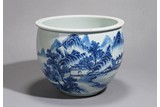 A CHINESE BLUE AND WHITE 'LANDSCAPE' BRUSHPOT