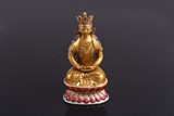 A CHINESE FAMILLE ROSE FIGURE OF AMITAYUS    
