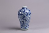 A CHINESE BLUE AND WHITE FOLIAGE SCROLL VASE