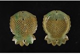 A CHINESE JADEITE RETICULATED 'DOUBLE FISH' POMANDER