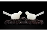 A PAIR OF WHITE JADE 'MAGPIE' BOX AND COVER 