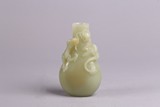 A CHINESE GREENISH WHITE JADE 'DRAGONS' VASE