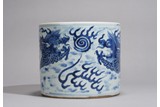 A CHINESE BLUE AND WHITE 'DRAGONS' INSCRIBED BRUSHPOT