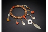 AN ALOESWOOD AND JADES ROSARY BRACELET