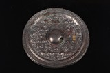 A CHINESE BRONZE FIGURES MIRROR