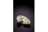 A CHINESE WHITE JADE MYTHICAL BEAST 