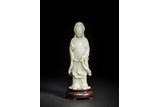 A WHITE JADE CARVING OF STANDING GUANYIN