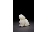 A CHINESE WHITE JADE CARVED MYTHICAL BEAST
