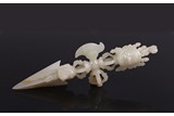 A CHINESE WHITE JADE VAJRA